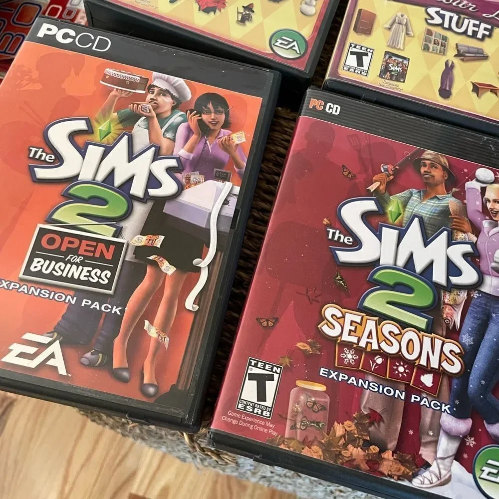 The SIMS PlayStation Vintage Side Video Game Lot PC DVD Pets Family Delux Sets